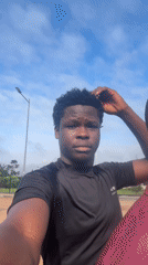 Morning street life and motorcycle traffic in Ihiagwa, Nigeria