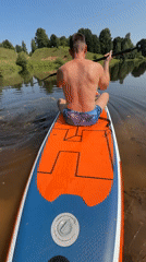 Quiet paddleboard session on a sunny Russian lake