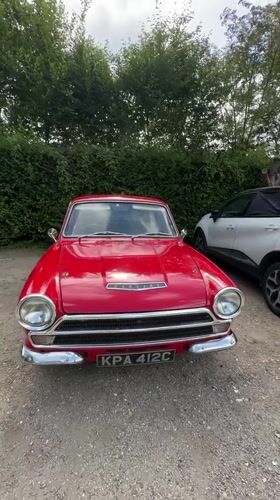 Red vintage Ford Cortina parked in Giverny, France