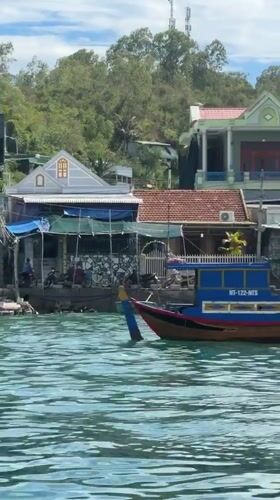Boat tour captures serene Nha Trang fishing harbor scene