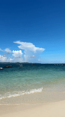Sunny morning on a rocky, turquoise shoreline in Phru Nai