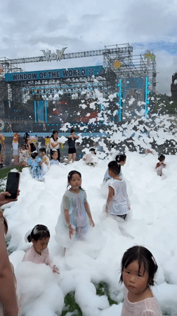 Foam party in full swing at Nanshan District outdoor event