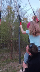 Father, daughter enjoy playground time in Chernogolovka park