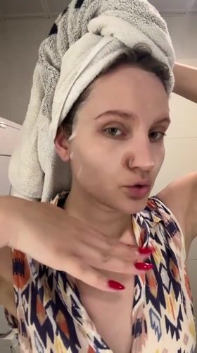 Woman applies face mask during skincare routine in Esenyurt