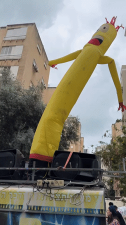 Children's parade with flags and drummers marches through Netanya