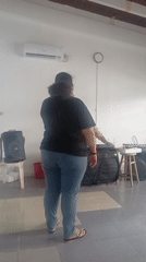 Woman sings with keyboardist in Juan Griego rehearsal space