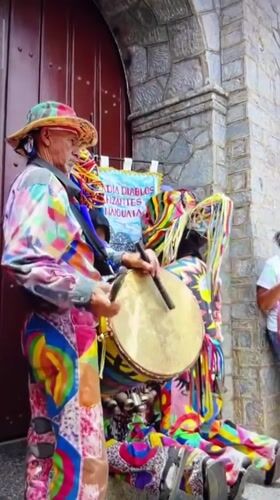 Costumed drummers perform in Tinaquillo, Venezuela