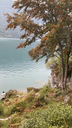 Afternoon at Lake Molveno, turquoise water and Dolomite backdrop