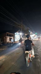 Nighttime motorcycle ride documented in Blangpeuria, Indonesia