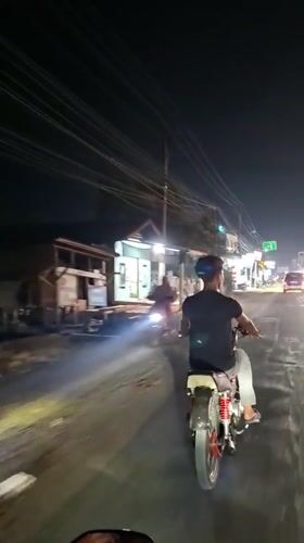 Nighttime motorcycle ride documented in Blangpeuria, Indonesia