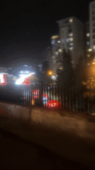 Rainy evening street scene documented in Tbilisi, Georgia