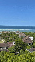 Aerial footage captures tropical resort coastline in Kuta Selatan