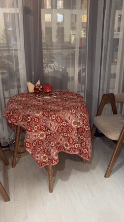 Inside an ornate Astana venue with pastries and traditional decor
