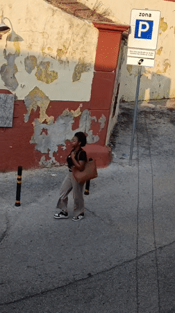 Evening foot traffic through Setúbal's urban streets