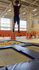Gymnast performs trampoline flip at Krasnoyarsk facility