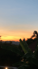 Vibrant sunset captured over tropical landscape in Thailand