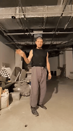Nunchaku practice in a bare concrete room, Qarağandı
