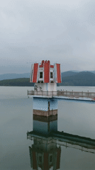 Tourists document scenic Tuyen Lam Lake tower in Da Lat
