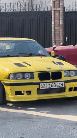 Modified yellow BMW spotted parked in Bishkek residential area