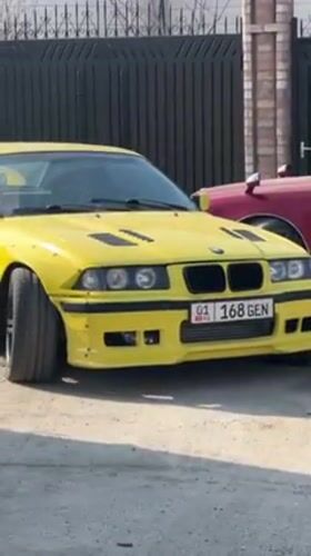 Modified yellow BMW spotted parked in Bishkek residential area