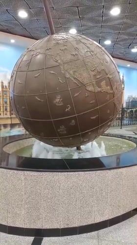Shopper documents Alice in Wonderland sculptures at Yekaterinburg mall