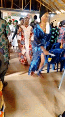 Community gathering observed at church hall with families
