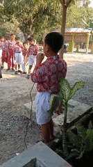 School assembly in session at a Tanjungsari schoolyard