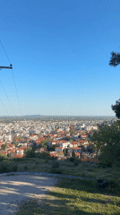 Tourist captures city overlook views in Xanthi, Greece