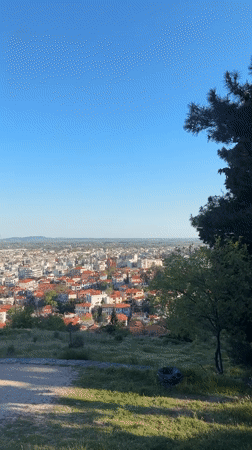 Tourist captures city overlook views in Xanthi, Greece