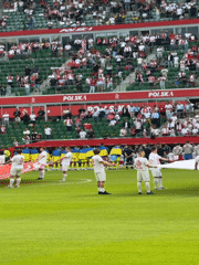Soccer match and outdoor dining captured in Poland