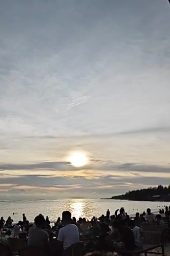 Beach gathering draws crowds to Monikeun, Indonesia shoreline