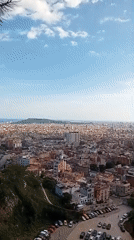 Panoramic daytime view captured of Barcelona cityscape from elevation