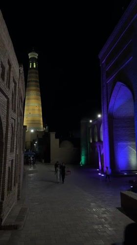 Evening tourism activity documented in historic Khiva, Uzbekistan