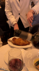 London diner documents restaurant meal near Trafalgar Square