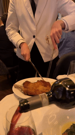 London diner documents restaurant meal near Trafalgar Square