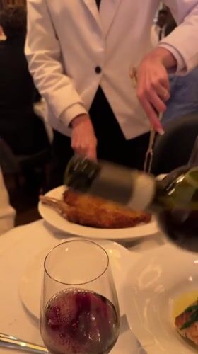 London diner documents restaurant meal near Trafalgar Square