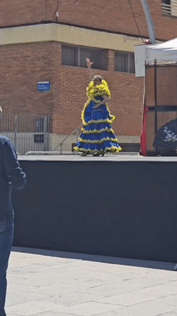 Flamenco dancer performs on outdoor stage in Cornellà De Llobregat