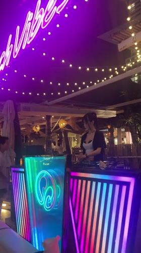Evening life documented across Nha Trang's clubs, markets, pharmacies