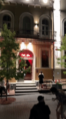 Nighttime city wandering: bars, streets, squares, and a DJ set