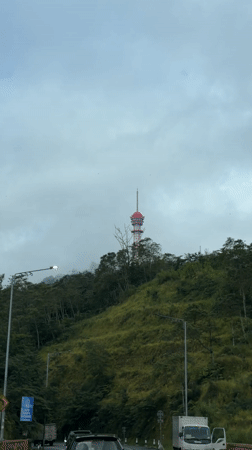 Red and white tower observed on Indonesian hillside