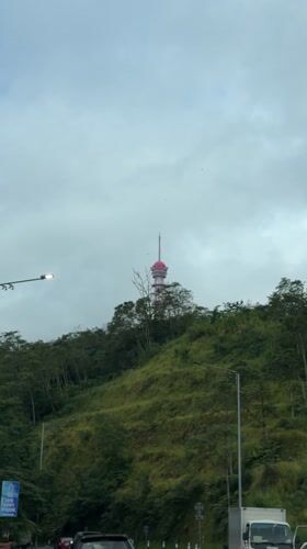 Red and white tower observed on Indonesian hillside