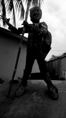 Child in Spider-Man costume plays across Nigerian neighborhoods