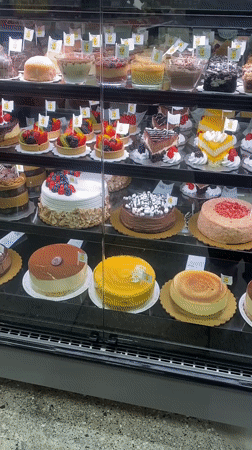 Fully stocked dessert display case in Los Angeles bakery