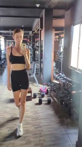 Woman takes gym selfie in Mengwi, Indonesia