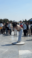 Early morning visitors gather at Temple of Heaven platform