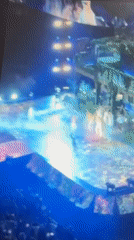Arena Concert Features Singer, Dancers on Illuminated Stages