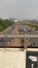 Daily traffic and residential gate observed in Abuja
