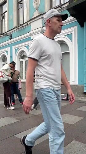 Summer afternoon street life and café moments in Saint Petersburg