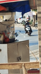 Morning street life along a Sragen roadside in Indonesia