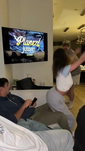 Young adults gather in Los Angeles living room